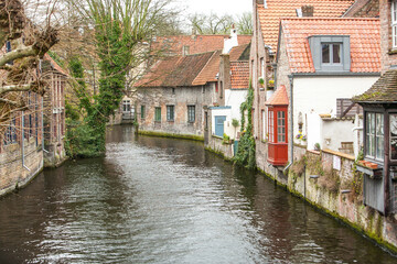 Fototapeta na wymiar A view looking down one of the many canals in Bruges, Belgium.
