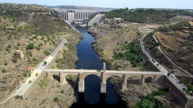 Aeria view of old bridge and beautiful landscape in a sunny day. Drone Footage