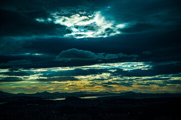 sunset sky in a city red with darkness