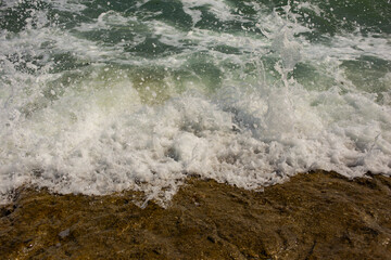 Waves during a storm. View from above. Red code. Rest on the Black Sea coast in Bulgaria. Elemental force.