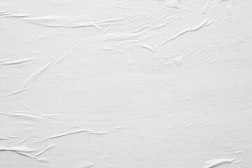 Blank white crumpled and creased paper poster texture background