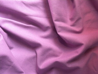 Lavender light purple color cotton fabric textured background with wrinkles