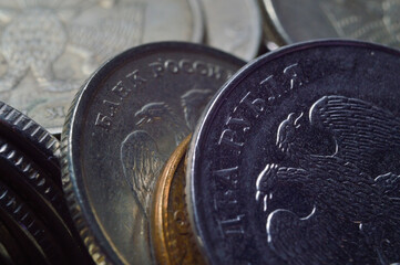 Coins, rubles, in bulk, close-up. Low key.