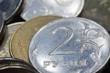Coins, rubles, in bulk, close-up. Low key.