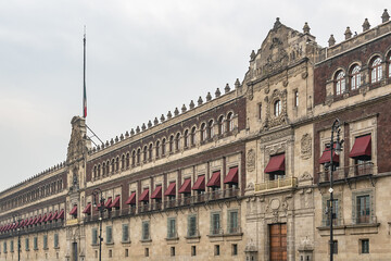 Obraz premium Architectural fragment of Palacio Nacional (National Palace or President's Palace). National Palace is the seat of the federal executive in Mexico. Zocalo, Plaza de la Constitucion, Mexico City.