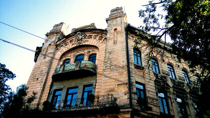 Fototapeta premium Ominous historic ancient building bottom view