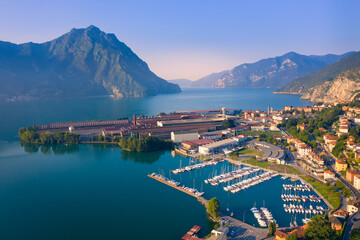Aerial view of Lake Iseo at sunrise, on the right the port of lovere,background mountains(alps), Bergamo Italy.