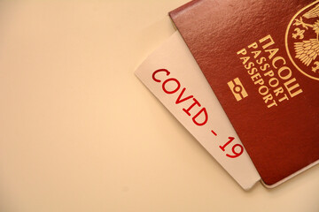 Coronavirus concept background. Passport and note on table with space for text, copy space