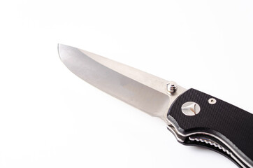 A folding knife with a black handle on a white background, open and closed. Paracord lanyard on the...
