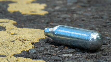 Empty Nitrous Oxide cartridges after used for drugs/human consumption	
