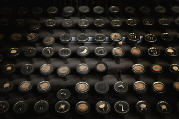 old buttons of old type writer matchine in dark light.