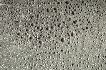 Bloated paint on the wall after a fire.