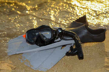 Diving equipment--Blue diving goggles,snorkel and flippers on