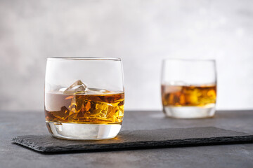 Close-up whiskey with ice cubes