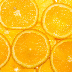orange slices backlit top view square