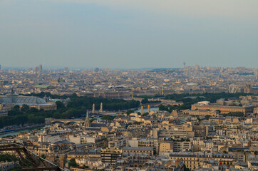 Fototapeta premium View of Paris, photographed on the top of Eiffel Tower in the evening