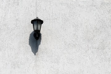 street lamp lighting on white painted wall