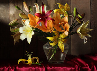 bouquet of lilies in a glass vase.