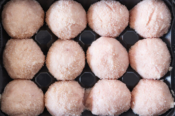 Raw food, chicken cutlets are ready for cooking. Cutlets in plastic packaging close-up.