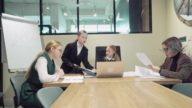 Dismissal concept. The girl brings a document for signing.
