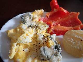 fresh hot scrambled eggs with vegetables