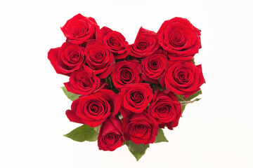 red roses in the shape of a heart on a white background
