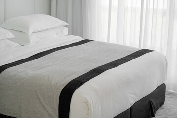 Double bed in the hotel. Modern double bed in bedroom interior in the hotel.
