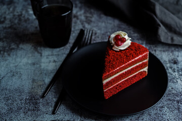 Red velvet cake with cream cheese filling in a plate