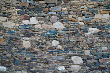 Stone old wall vintage texture background brick siding different sized stones