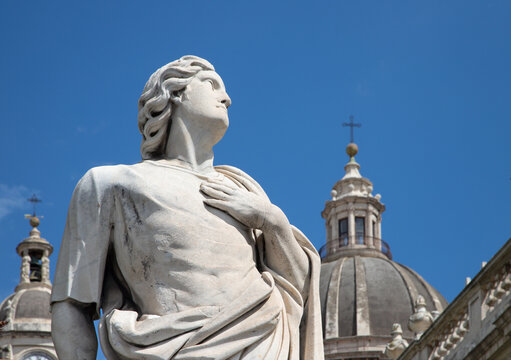 CATANIA, ITALY - APRIL 8, 2018: The statue of St. Sextus (Sixtus) in front of Basilica di Sant'Agata.