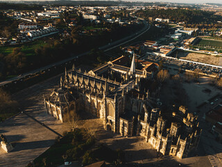 Obraz na płótnie Canvas Aerial view of the Batalha Monastery in Portugal, during sunset.