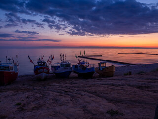 some fishing boats at the beach of the Baltic Sea shortly befor sunrise