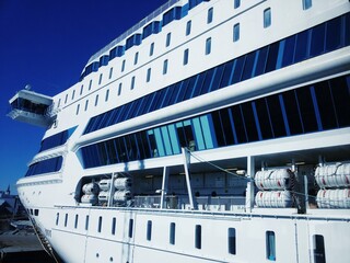 Large white cruise ship in the port