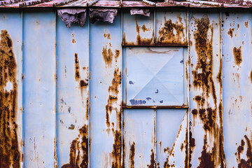 Old Rusty Blue Metal Shed
