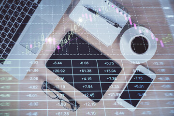 Multi exposure of forex graph hologram over desktop with phone. Top view. Mobile trade platform concept.
