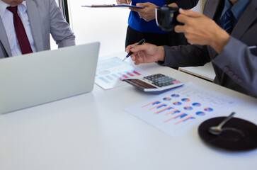 soft focus Businessman team analyzing cost projects in the office .concept