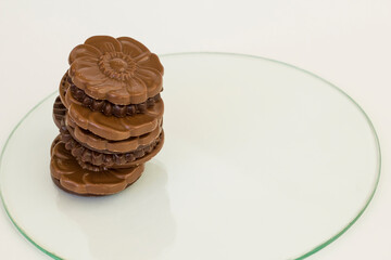 Milky and bitter round shape chocolate Madlen,designed on glass plate.The Sugar Feast or any festival celebration.