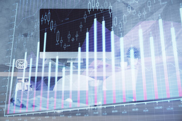 Multi exposure of financial graph drawing and office interior background. Concept of market analysis.