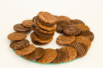 Milky and bitter round shape chocolate Madlen,designed on glass plate.The Sugar Feast or any festival celebration