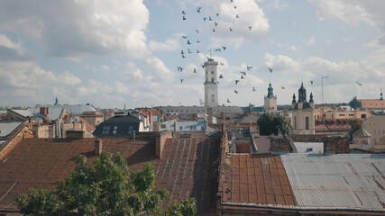 Obraz premium Aerial drone shot of european city Lviv, Ukraine. Flight above popular ancient part of old town