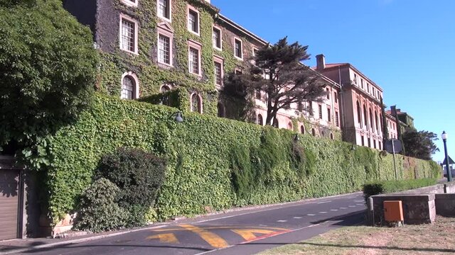 HD sunny day video of spectacular University of Cape Town, its sport grounds, green trees, old buildings and shady alleys in Western Cape, Cape Town, South Africa