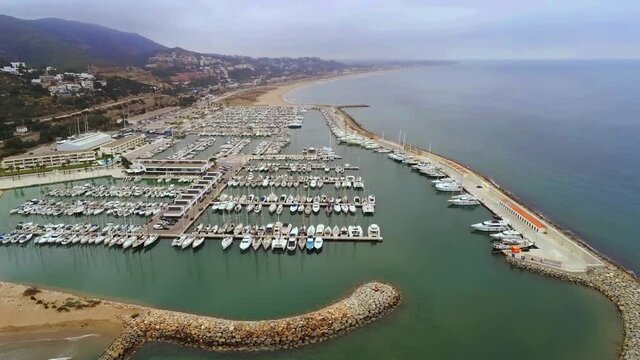 Aerial view of a boats and yachts moored in marina Drone Footage
