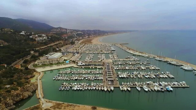 Aerial view of a boats and yachts moored in marina Drone Footage