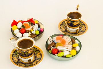 Traditional Turkish Colorful candy and delight on fabric cloth with coffee