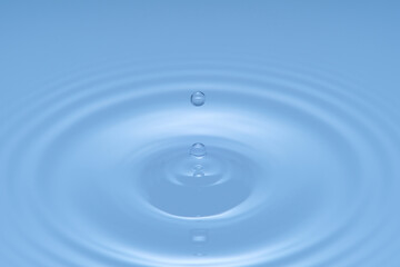 Naklejka na ściany i meble Water Drop - Pure clear and transparent of water and ripple in bright background. Creative modern concept, for graphic design, website, poster, placard and wallpaper.