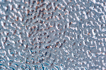 Silver foil texture. macro photo. general plan. color