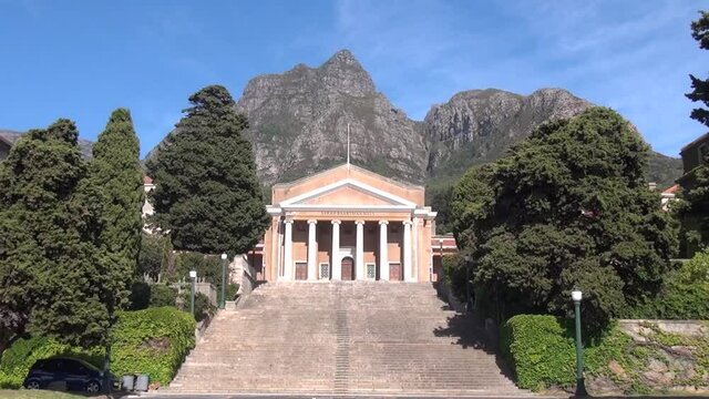 HD sunny day video of spectacular University of Cape Town, its sport grounds, green trees, old buildings and shady alleys in Western Cape, Cape Town, South Africa