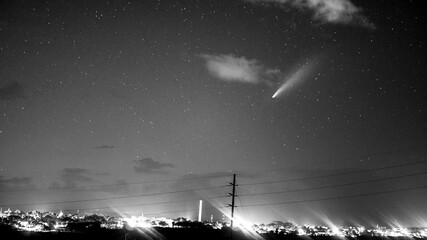 NEOWISE comet above Lahaina town in Maui, Hawaii