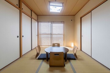 Black wooden table and cushions in the Japanese-style living room