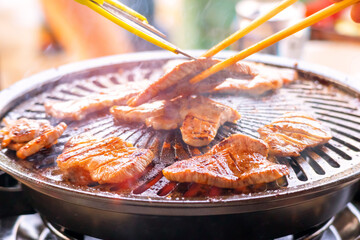 Beef tongue being baked on an iron plate 587